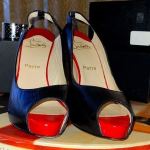 Christian Louboutin black leather slingbacks